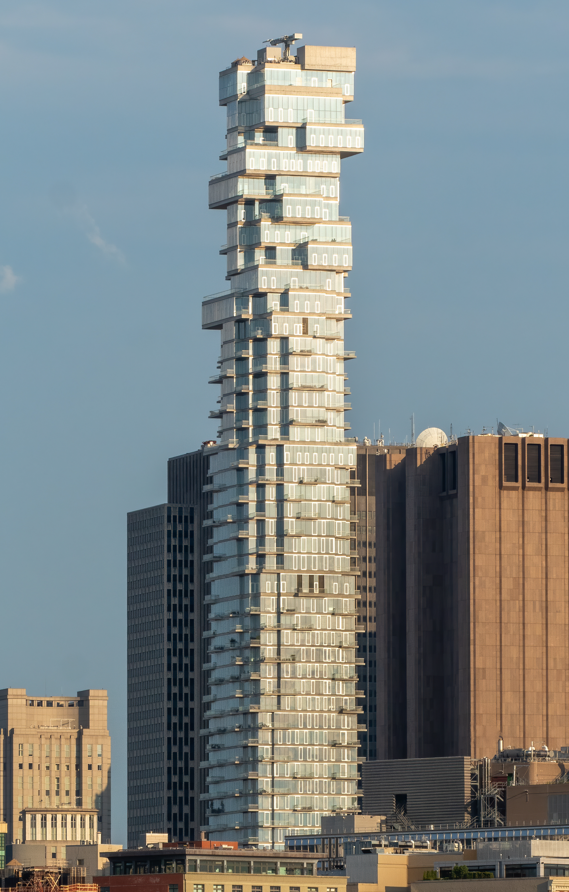 Vertical exterior emphasizing the Jenga stacking